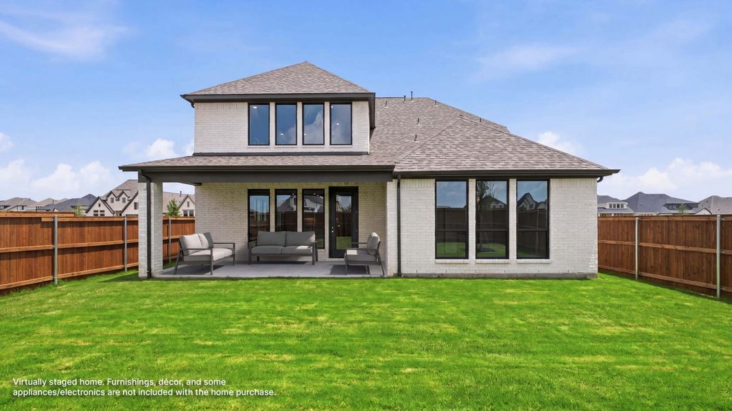Exterior details and patio area of a home in Cambridge Crossing, Celina (Image 2).
