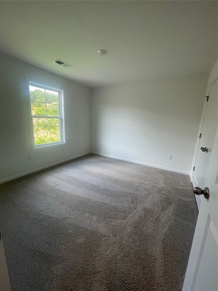 Spacious, unfurnished interior of a new home in Springwood Grove, Central (Image 24). Spacious, unfurnished interior of a new home in Springwood Grove, Central (Image 24).