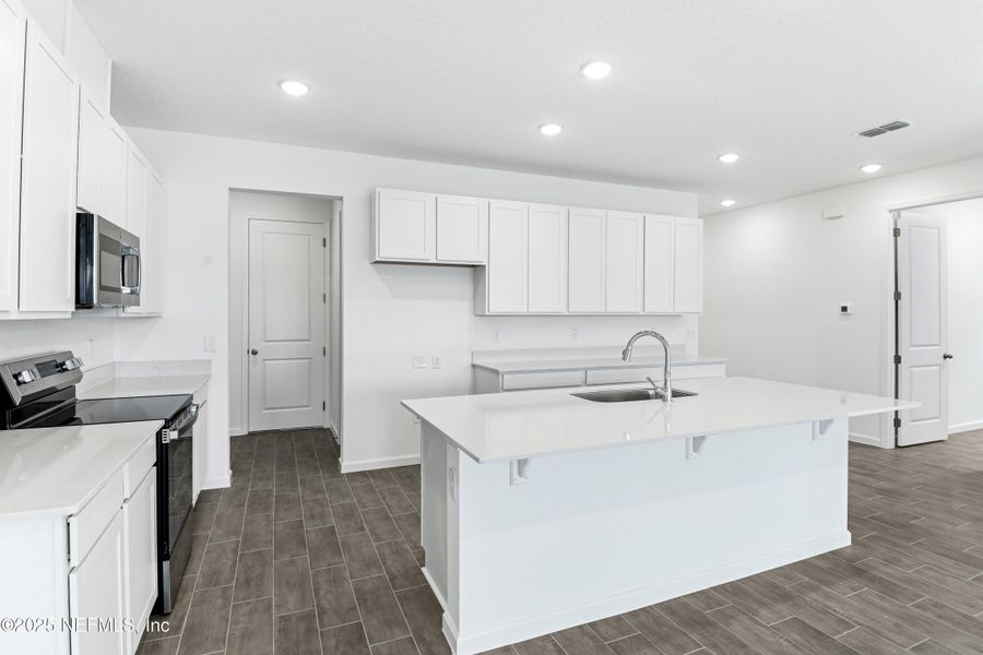 Furnished interior view inside a new home in Seasons at Grandview Gardens, Deland (Image 7).