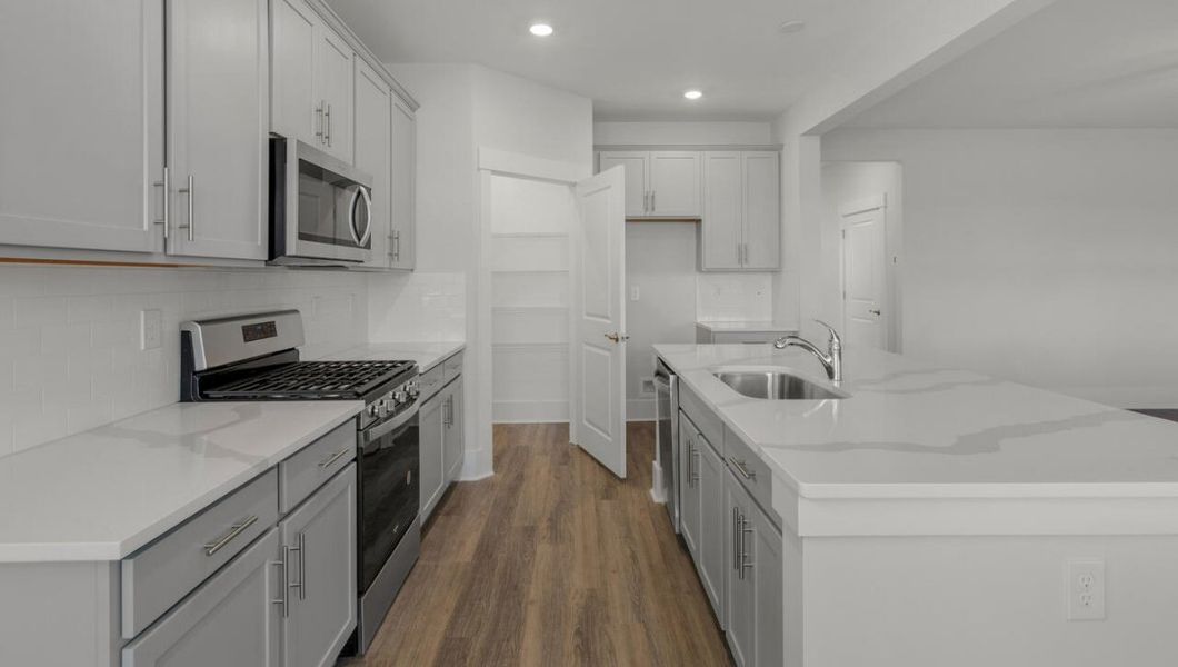 Representative furnished interior of a home built from the MADISON by D.R. Horton in The Grove at Blake Farm, Wilmington (Image 7). Representative furnished interior of a home built from the MADISON by D.R. Horton in The Grove at Blake Farm, Wilmington (Image 7).