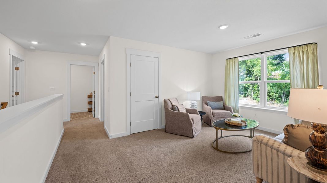 Furnished interior view inside a new home in Lone Oaks Farm, Cleveland (Image 35).