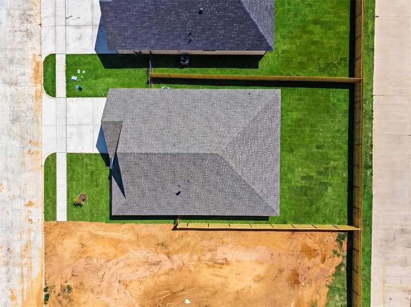 Exterior details and patio area of a home in , Tolar (Image 29).