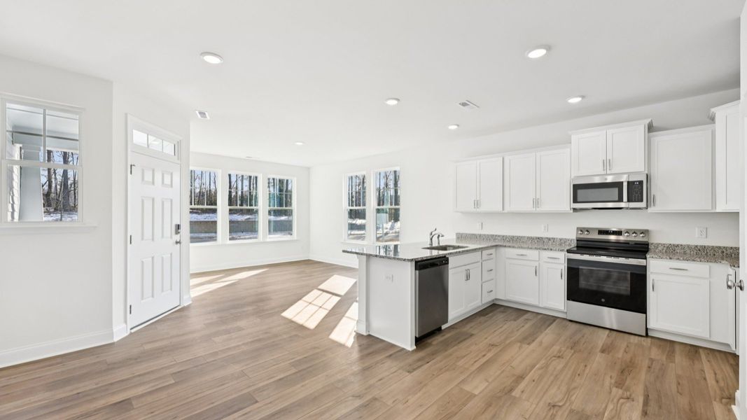 Furnished interior view inside a new home in Battle Bridge, Raleigh (Image 8).