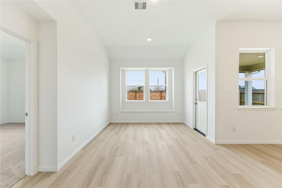 Spacious, unfurnished interior of a new home in Sunterra, Katy (Image 24).