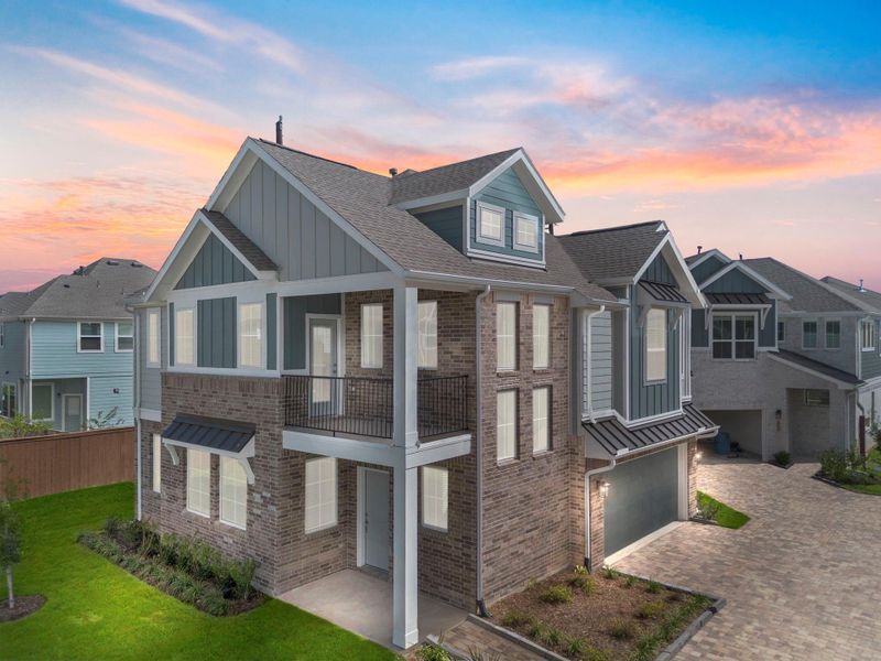 Front exterior of a new home in Meridiana, Manvel, TX, highlighting curb appeal (Image 19). Front exterior of a new home in Meridiana, Manvel, TX, highlighting curb appeal (Image 19).