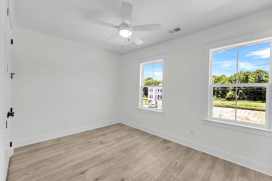 Spacious, unfurnished interior of a new home in Miller's Crossing, Johns Island (Image 18). Spacious, unfurnished interior of a new home in Miller's Crossing, Johns Island (Image 18).