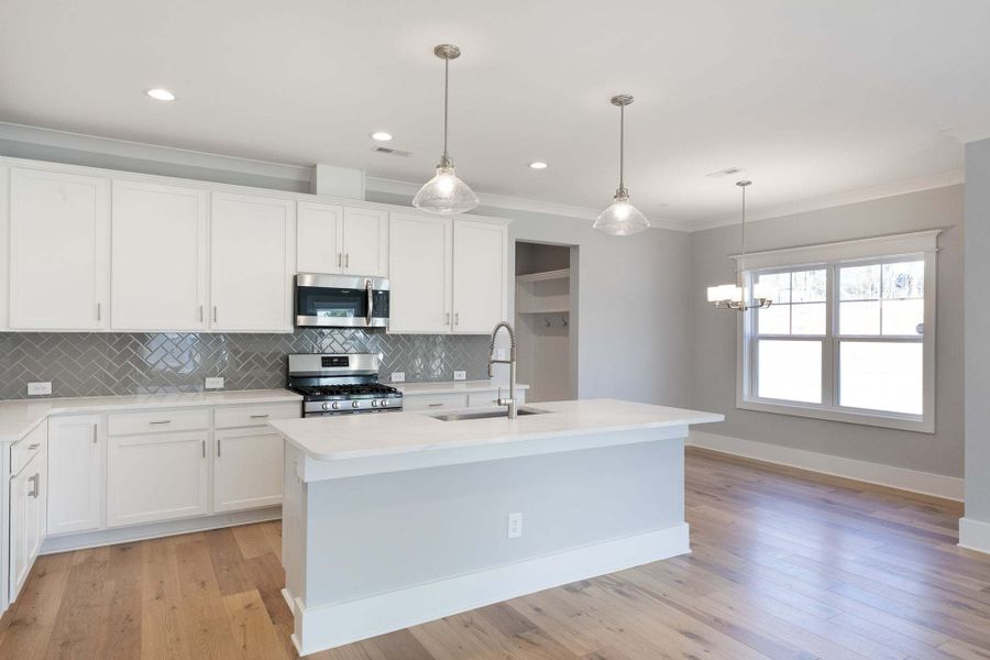 Representative furnished interior of a home built from the Austin by Caviness & Cates Communities in Bartlett Manor, Youngsville (Image 107).
