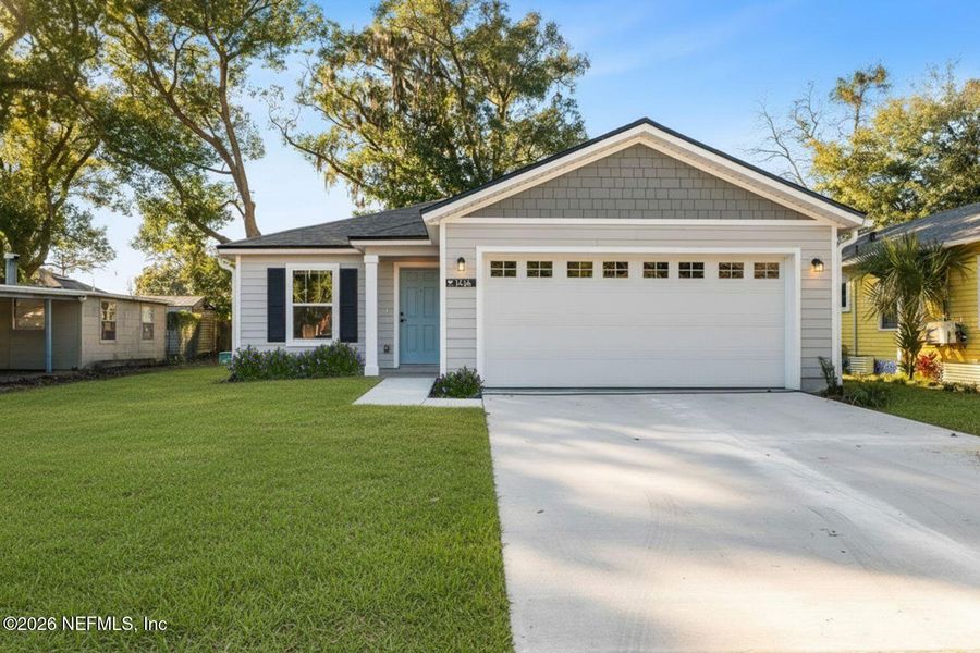 Front exterior of a new home in , Jacksonville, FL, highlighting curb appeal (Image 22).