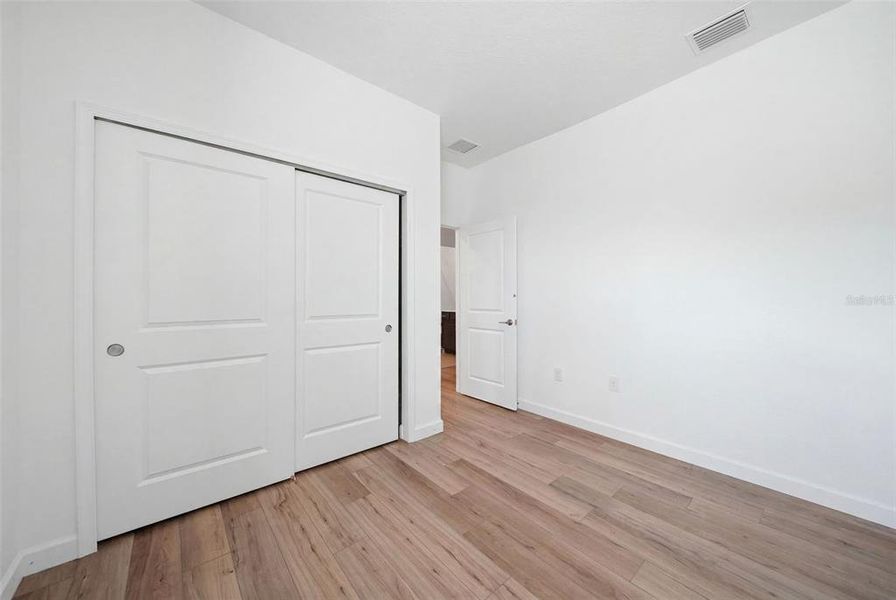 Spacious, unfurnished interior of a new home in The Timbers at Everlands, Palm Bay (Image 39).