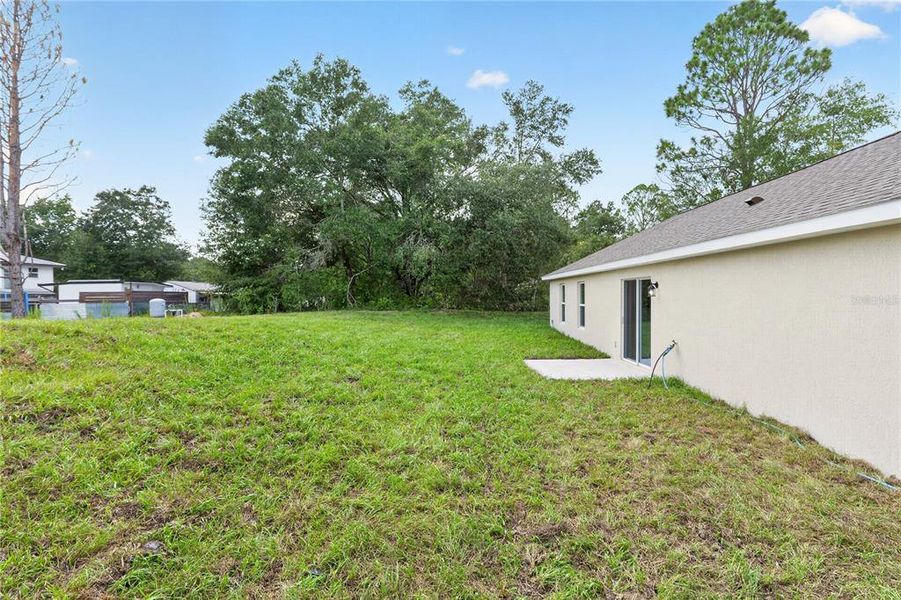 Exterior details and patio area of a home in , Dunnellon (Image 36).