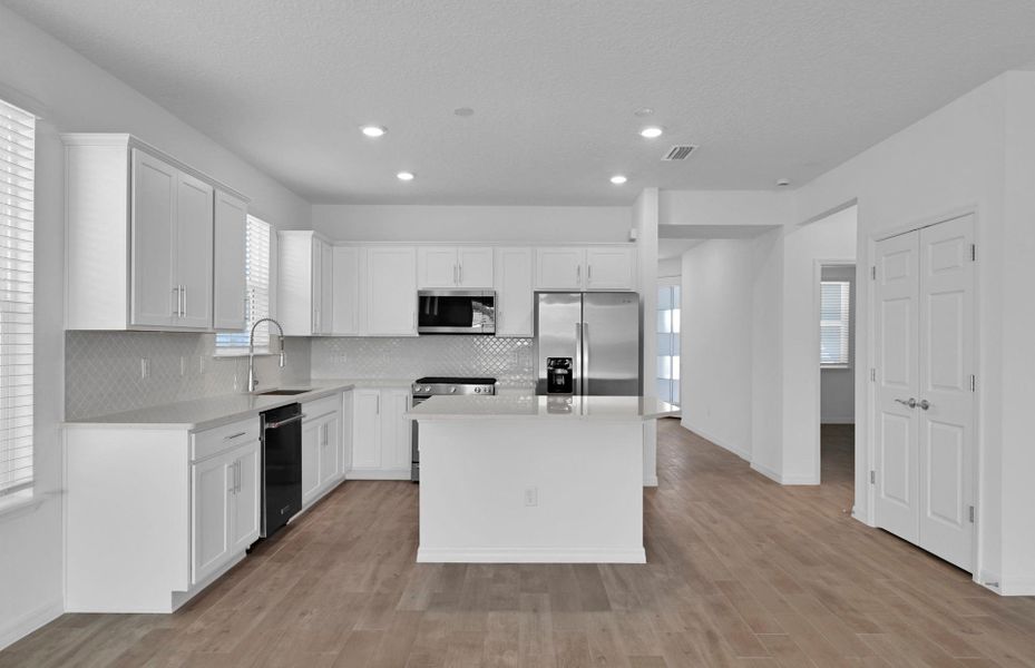 Furnished interior view inside a new home in Del Webb Wildlight, Yulee (Image 6).