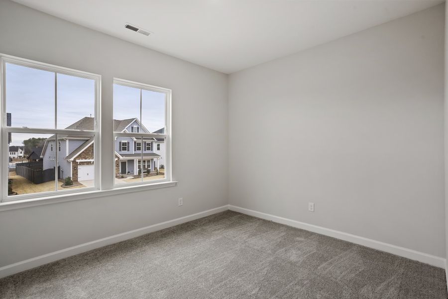 Spacious, unfurnished interior of a new home in Sweetbrier, Durham (Image 16).