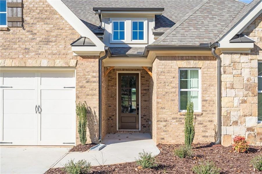 Exterior details and patio area of a home in Yellowstone Farms, Cumming (Image 27).