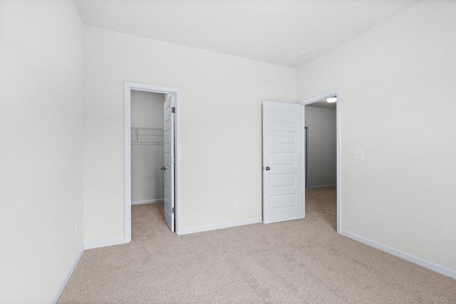 The Dove- Bedroom 2. Home under construction, photo used for illustrative purposes only, colors and options will vary.