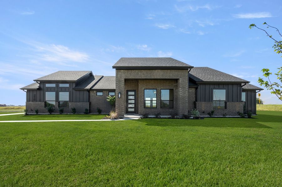 Front exterior of a new home in Carrera Ranch, Waxahachie, TX, highlighting curb appeal (Image 1). Front exterior of a new home in Carrera Ranch, Waxahachie, TX, highlighting curb appeal (Image 1).