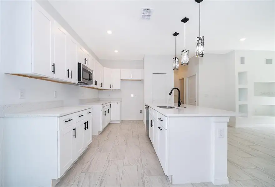 Furnished interior view inside a new home in , Kissimmee (Image 5).