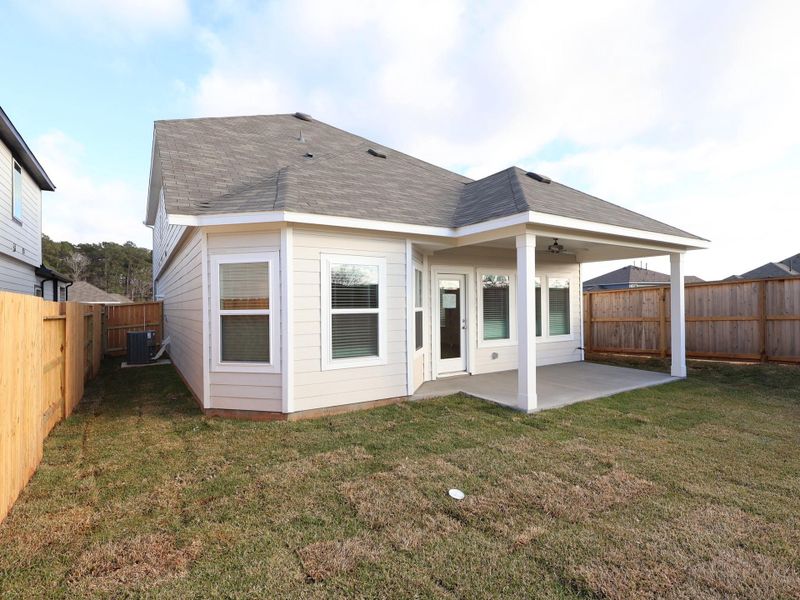 Exterior details and patio area of a home in Lone Star Landing, Montgomery (Image 20).