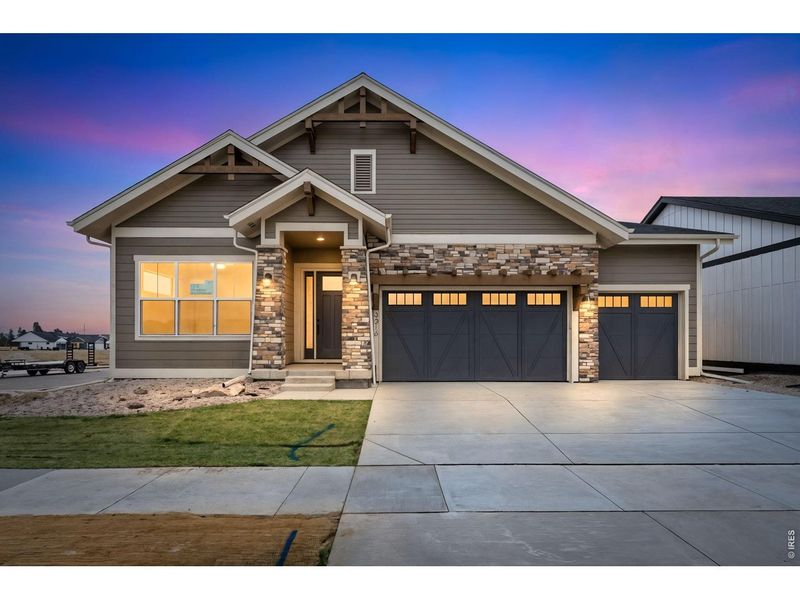Front exterior of a new home in , Fort Collins, CO, highlighting curb appeal (Image 25).