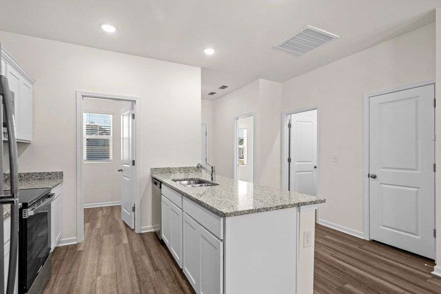Representative furnished interior of a home built from the Highland by Starlight Homes in Sutton Farms, San Antonio (Image 10).