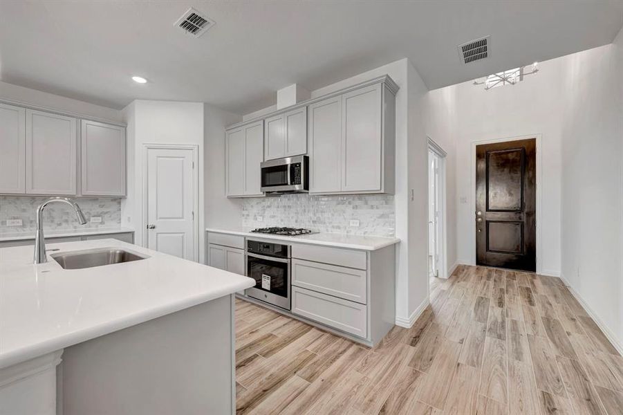 Furnished interior view inside a new home in Lilyana, Celina (Image 12).