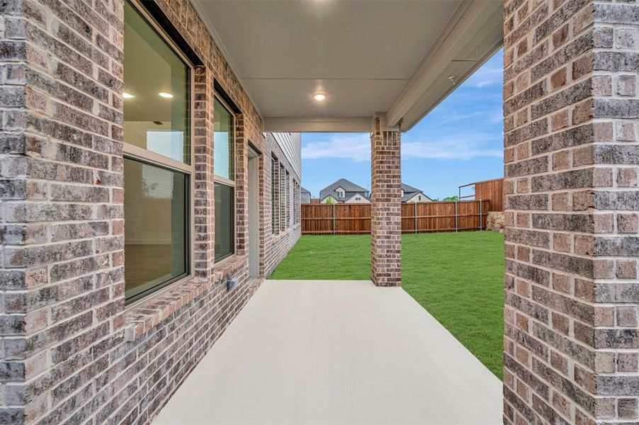 Exterior details and patio area of a home in Vintage Village, Argyle (Image 21).