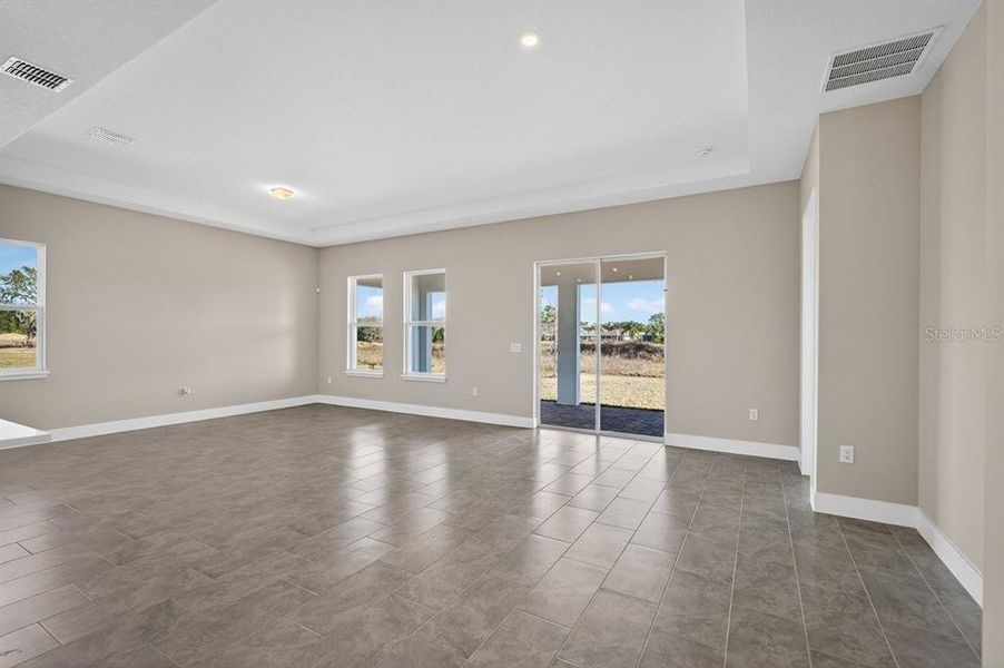 Spacious, unfurnished interior of a new home in Gray Hawk at Hole Two, Daytona Beach (Image 52).