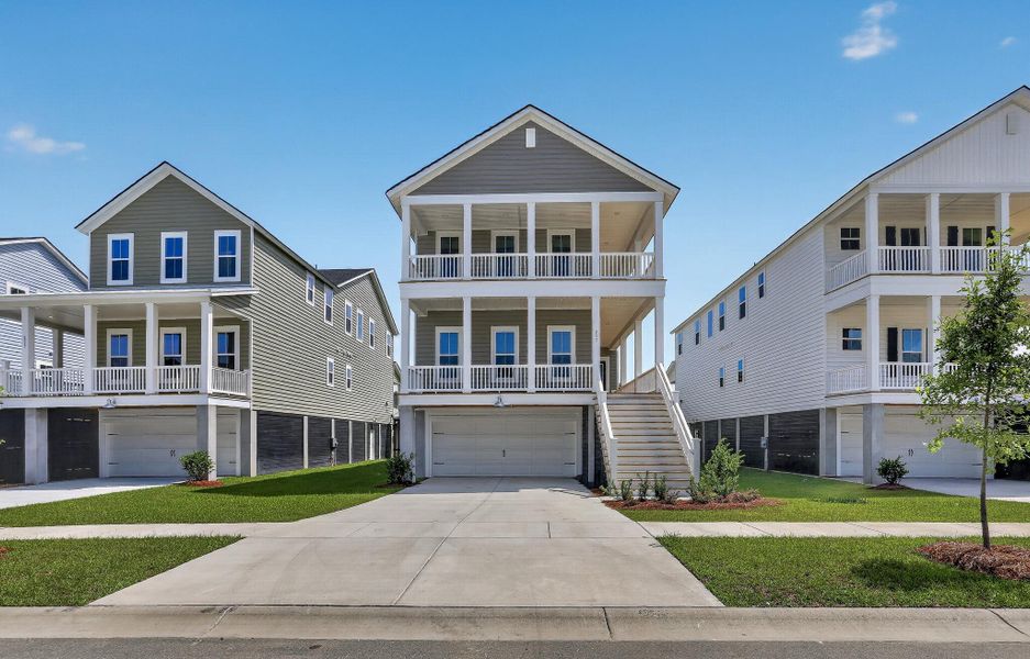 Front exterior of a new home in Heron's Walk at Summers Corner, Summerville, SC, highlighting curb appeal (Image 2). Front exterior of a new home in Heron's Walk at Summers Corner, Summerville, SC, highlighting curb appeal (Image 2).