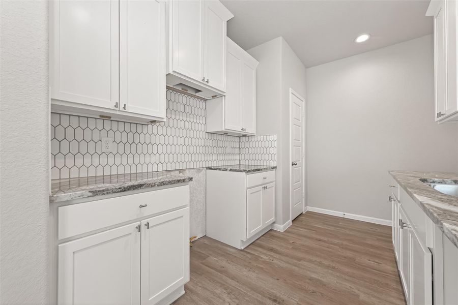 Furnished interior view inside a new home in Woodland Lakes, Huffman (Image 6).