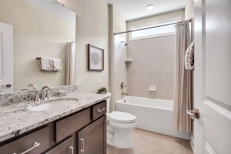 Furnished interior view inside a new home in The Bluffs On the Cape Fear, Leland (Image 22).