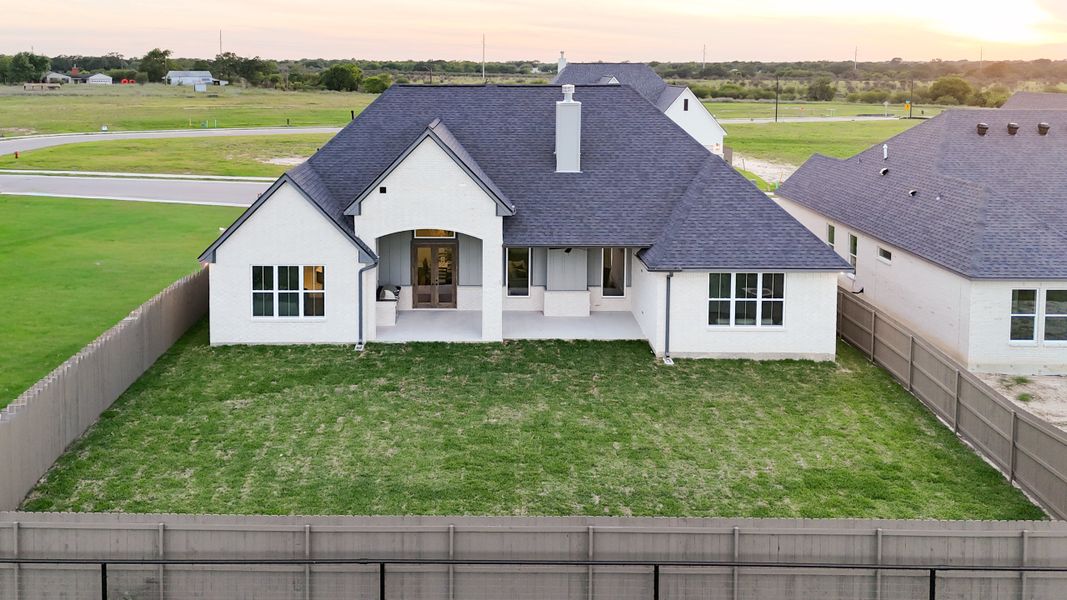 Exterior details and patio area of a home in Stella Ranch, Bryan (Image 34).