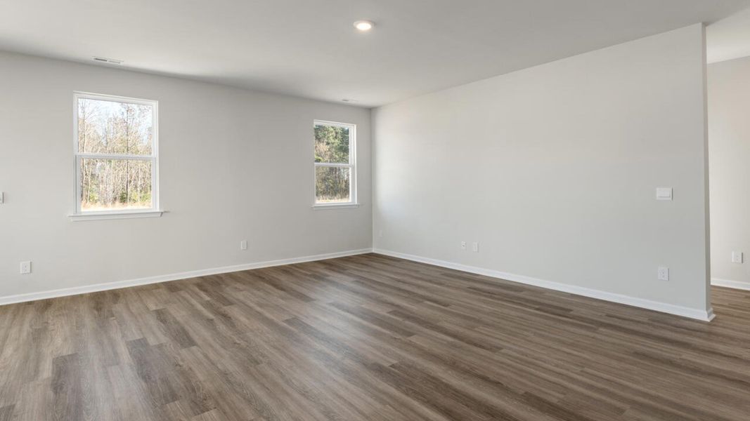 Representative unfurnished interior of a home built from the HARBOR OAK by D.R. Horton in Indigo Preserve, Leland (Image 29).