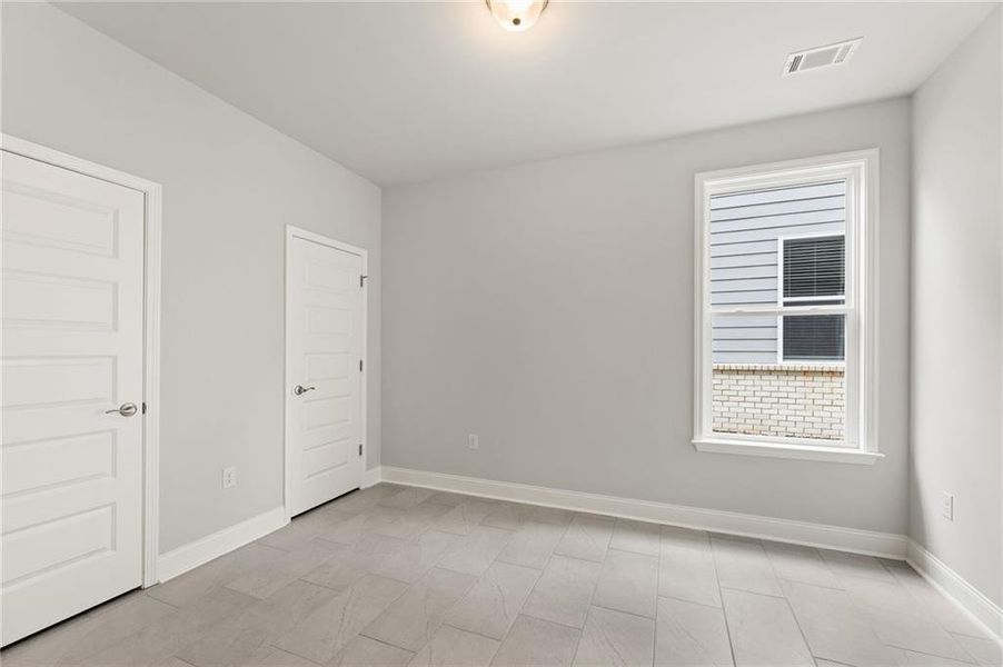 Spacious, unfurnished interior of a new home in Cooper's Walk, Loganville (Image 22).