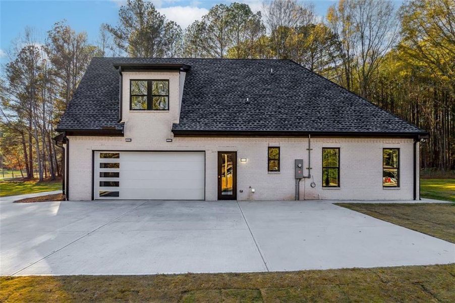 Front exterior of a new home in , Monroe, GA, highlighting curb appeal (Image 27).