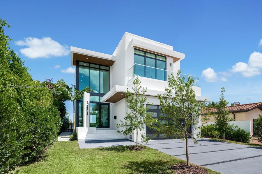 Front exterior of a new home in , Miami Beach, FL, highlighting curb appeal (Image 2). Front exterior of a new home in , Miami Beach, FL, highlighting curb appeal (Image 2).