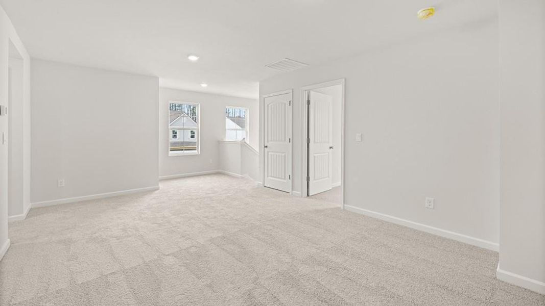 Spacious, unfurnished interior of a new home in Parkside at Carter Grove, Cartersville (Image 15).