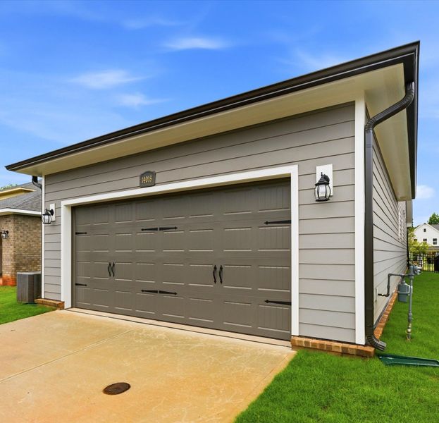 Exterior details and patio area of a home in Whitley Preserve – Park Collection, Mint Hill (Image 3).