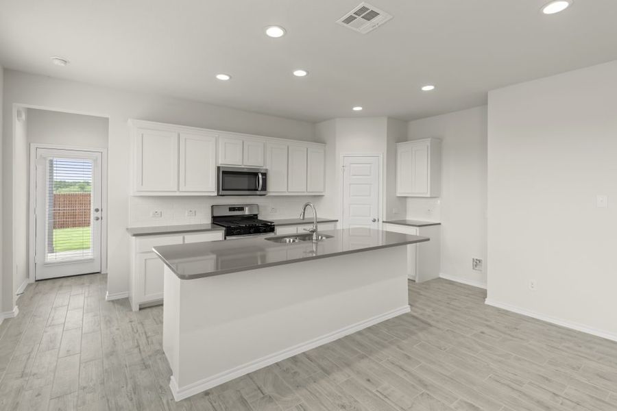 Representative exterior photo of a completed home built from the Cottonwood by Impression Homes in Northspur, Terrell, TX (Image 5).