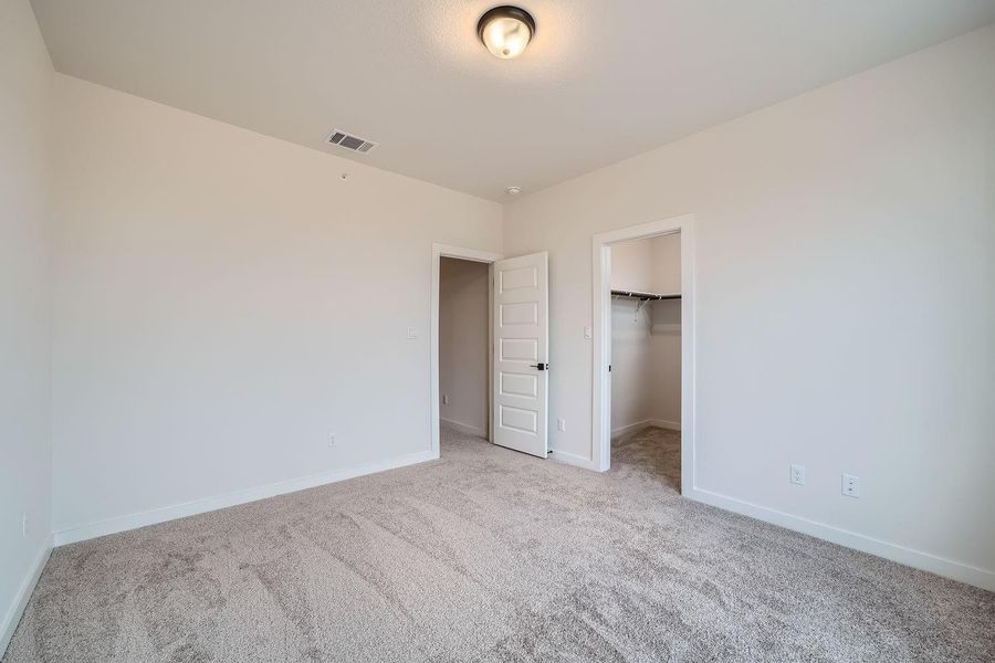 Spacious, unfurnished interior of a new home in Townhomes at Gattis, Round Rock (Image 21).