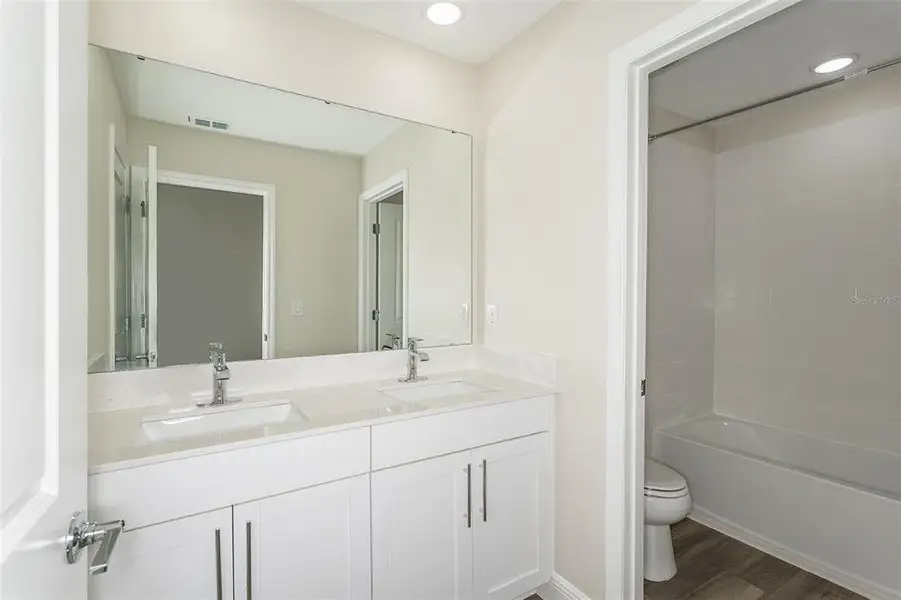 Furnished interior view inside a new home in Pasadena Woods, Dade City (Image 3).