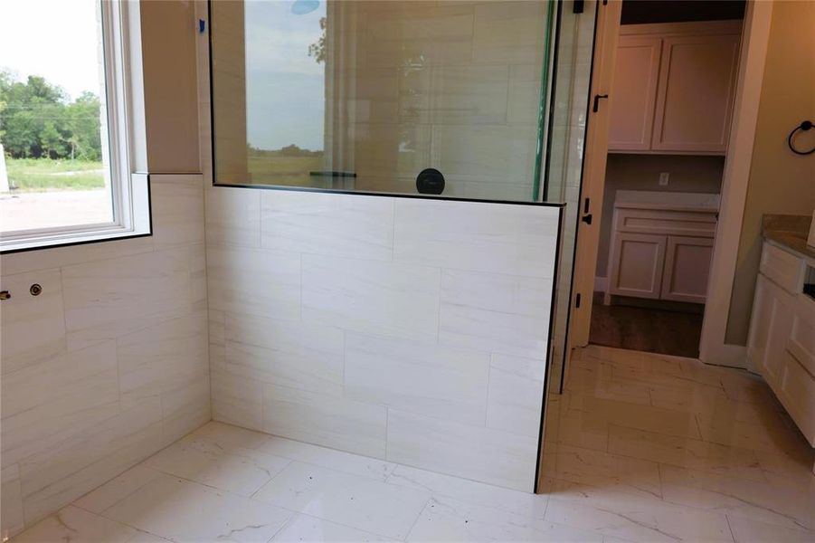 Bathroom featuring tile patterned flooring