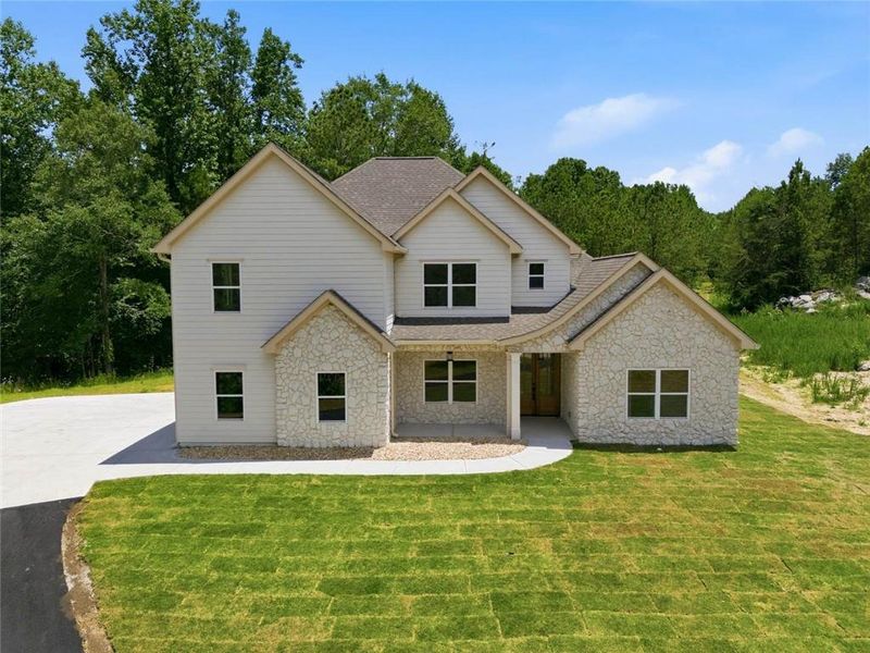 Front exterior of a new home in , Douglasville, GA, highlighting curb appeal (Image 19). Front exterior of a new home in , Douglasville, GA, highlighting curb appeal (Image 19).