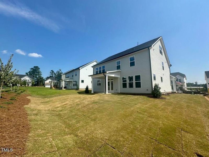 Front exterior of a new home in Glenmere, Knightdale, NC, highlighting curb appeal (Image 117). Front exterior of a new home in Glenmere, Knightdale, NC, highlighting curb appeal (Image 117).