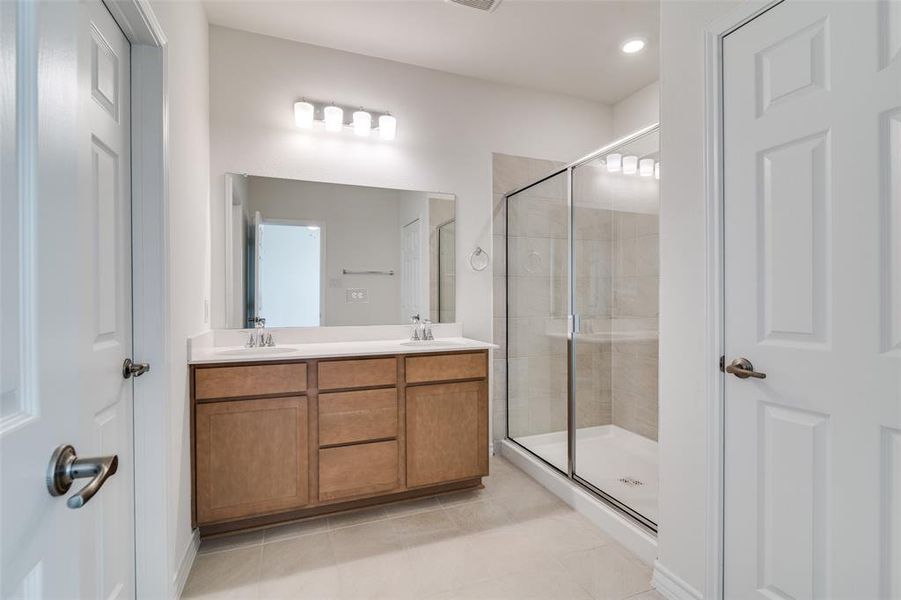 Furnished interior in a model home at Cottonwood Creek in Seagoville (Image 8).