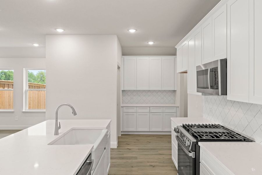 Furnished interior view inside a new home in Creekside, Royse City (Image 11).