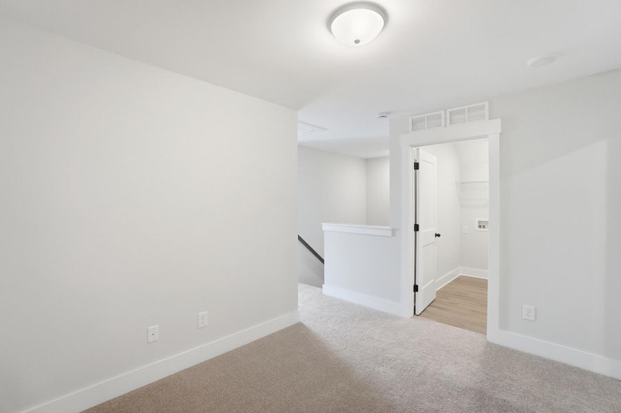 Spacious, unfurnished interior of a new home in Blythe Mill Townhomes, Waxhaw (Image 21).