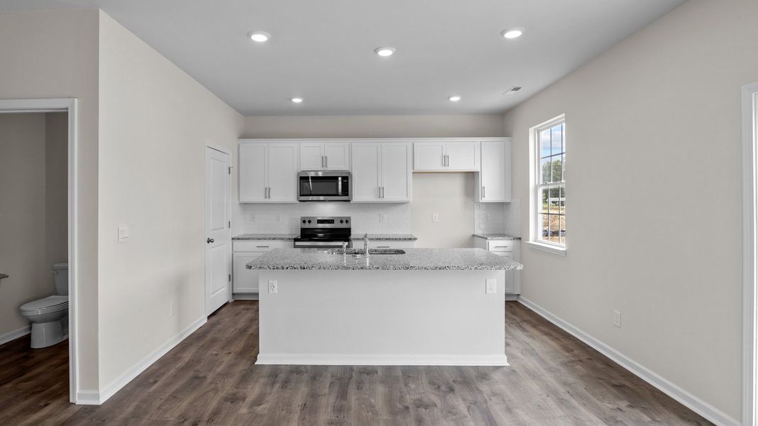 Furnished interior view inside a new home in Tyler - Home on the Lake, New Bern (Image 6).