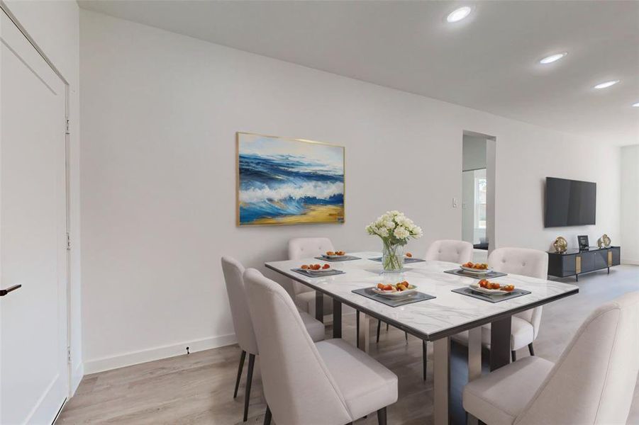 Dining area featuring light wood-type flooring