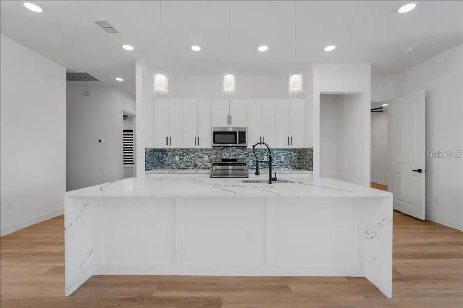 Furnished interior view inside a new home in , Port Charlotte (Image 11).