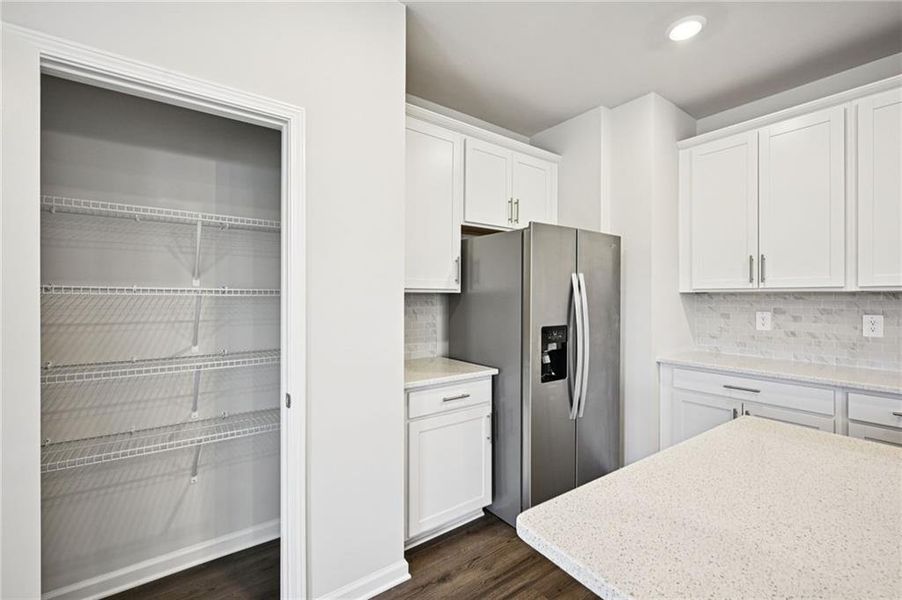 Furnished interior view inside a new home in Avalon - Reserve Series, Conyers (Image 10). Furnished interior view inside a new home in Avalon - Reserve Series, Conyers (Image 10).