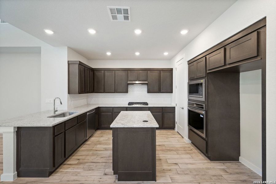 Furnished interior view inside a new home in VIDA, San Antonio (Image 5).